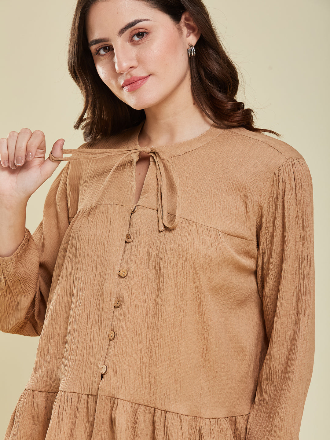 Brown Crinkled Peplum Top with Tie-Up Neck