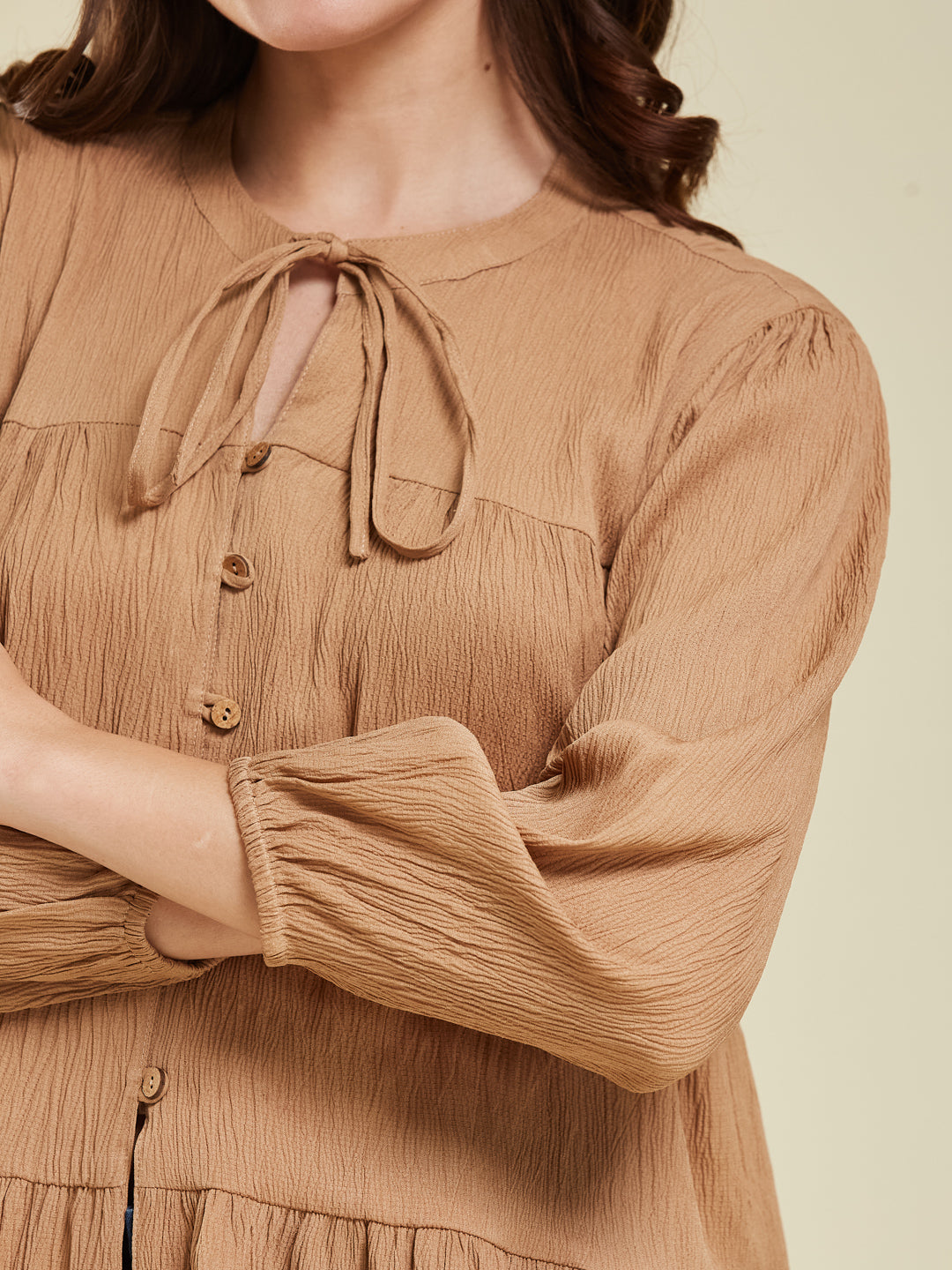 Brown Crinkled Peplum Top with Tie-Up Neck
