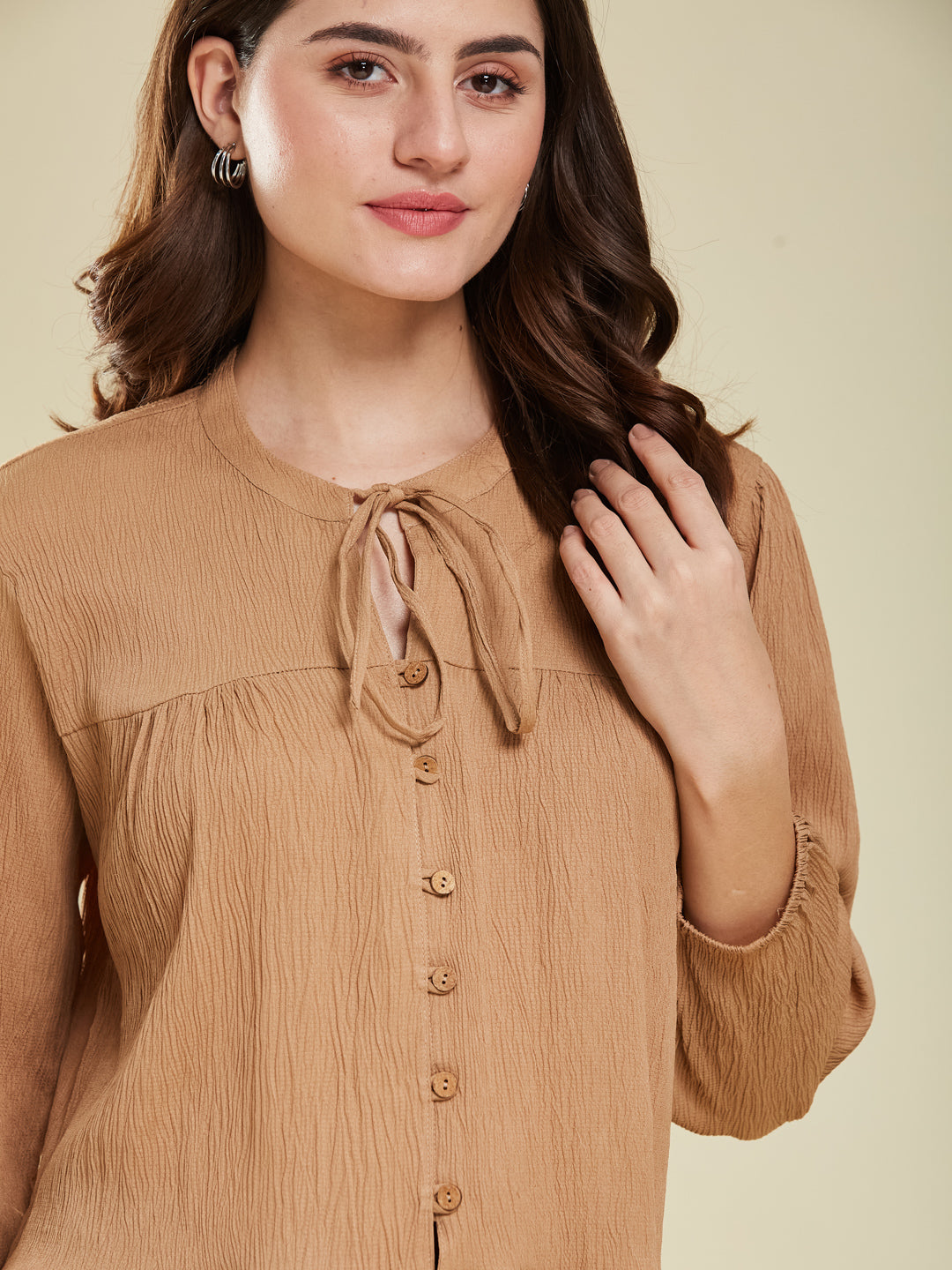 Brown Crinkled Peplum Top with Tie-Up Neck