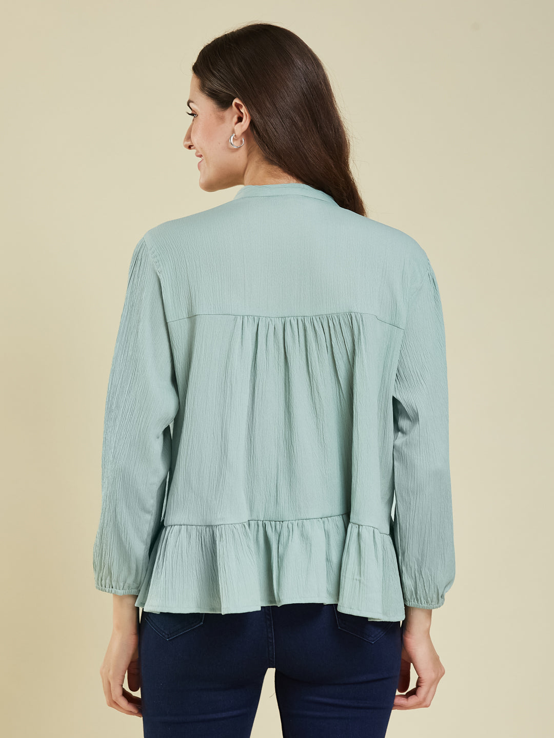 Aqua blue Crinkled Peplum Top with Tie-Up Neck