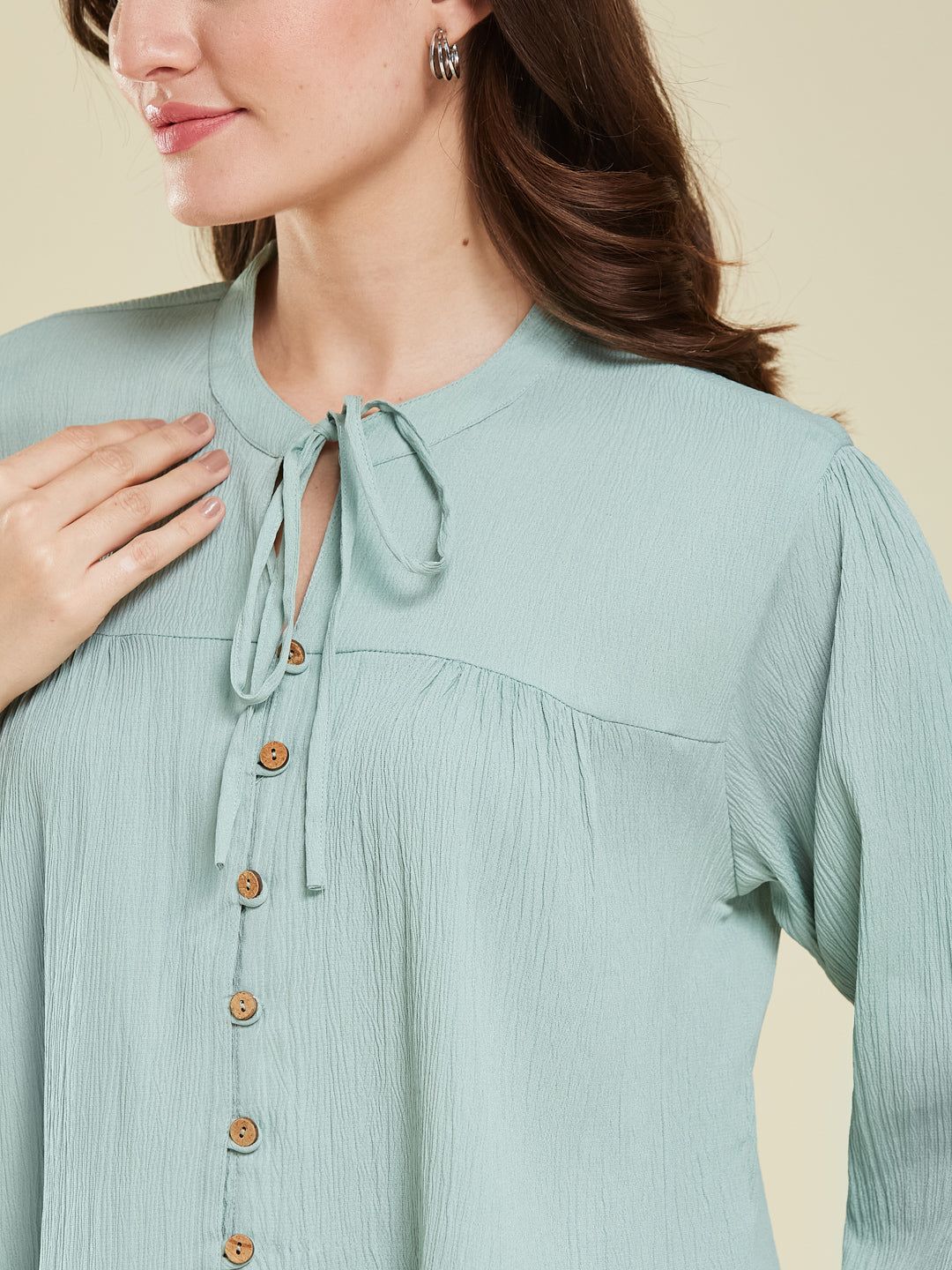 Aqua blue Crinkled Peplum Top with Tie-Up Neck