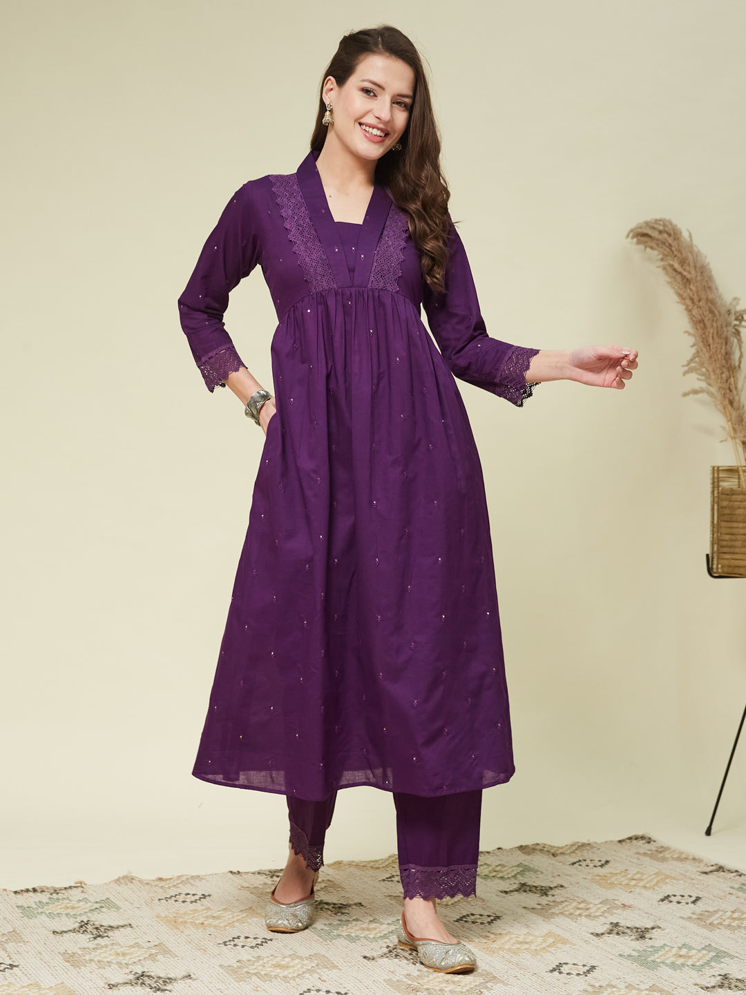 A woman modeling a violet cotton embroidered co-ord set, featuring intricate embroidery on the fabric. Violet Cotton Embroidered Co-Ord Set for Women