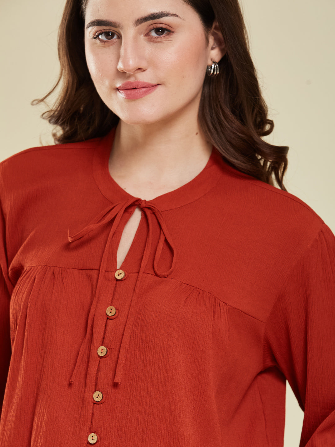 Rust Crinkled Peplum Top with Tie-Up Neck