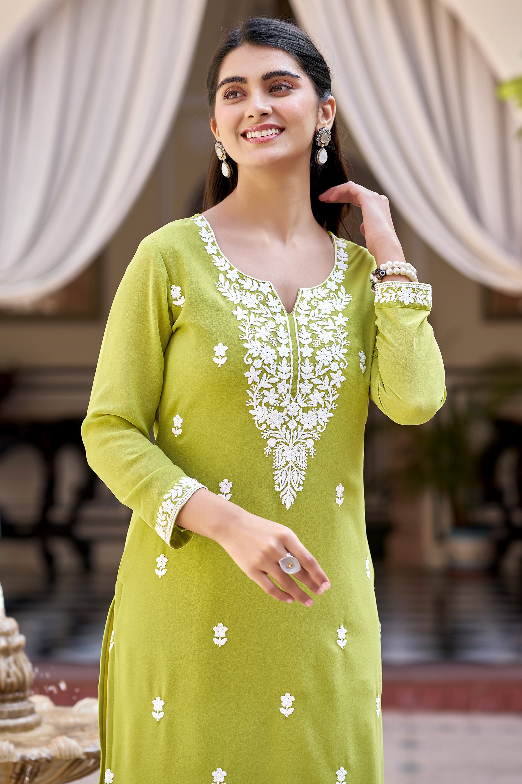 Pista Solid Embroidered Georgette Straight Kurta Set